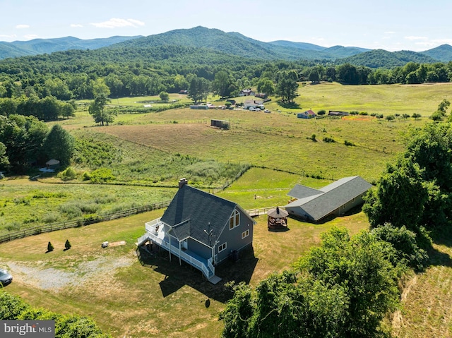 aerial view with a mountain view and a rural view