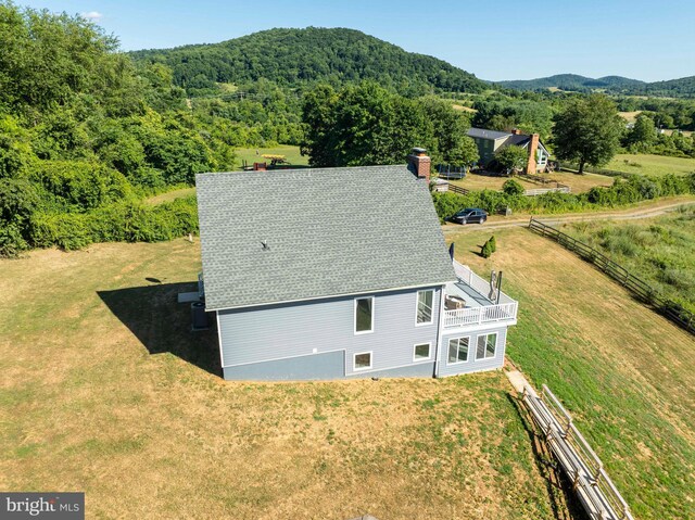 drone / aerial view featuring a mountain view