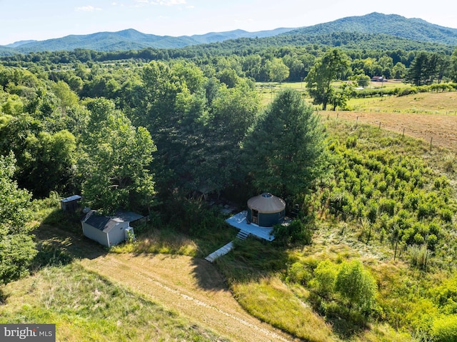 drone / aerial view featuring a mountain view