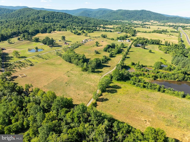 bird's eye view with a rural view and a water and mountain view