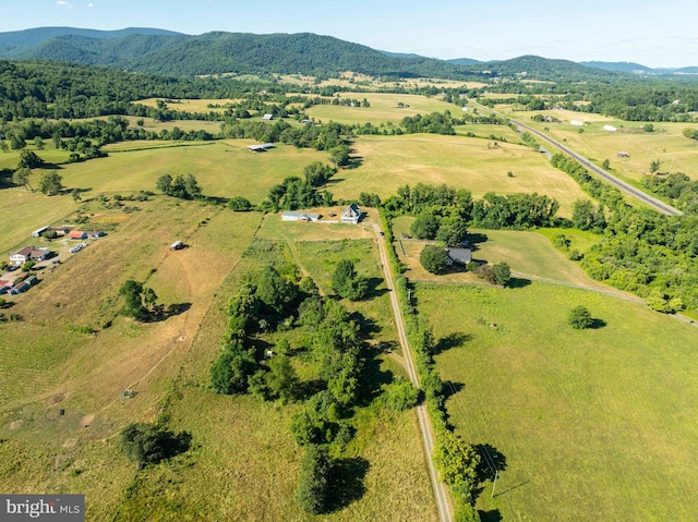 drone / aerial view featuring a mountain view