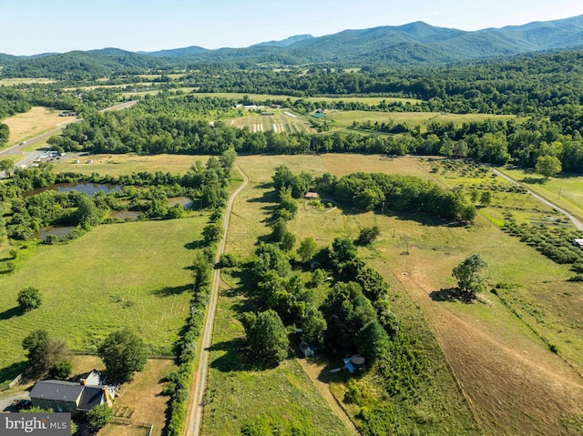 bird's eye view featuring a mountain view and a rural view