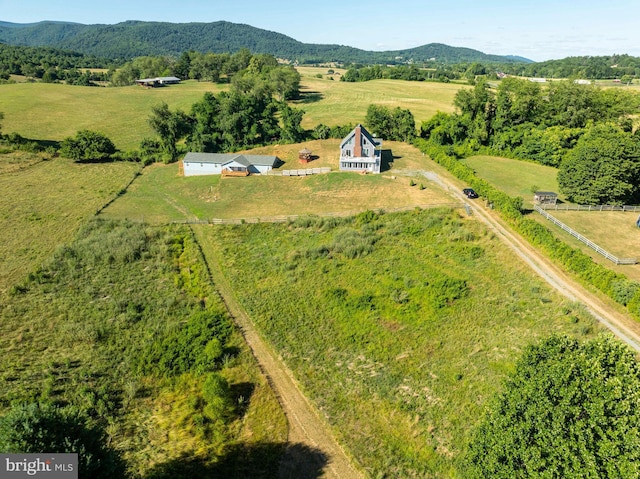 bird's eye view with a mountain view and a rural view