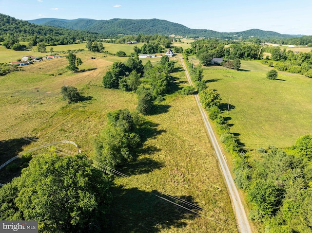 drone / aerial view featuring a mountain view