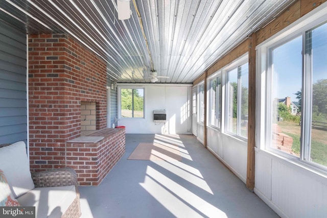 sunroom with heating unit