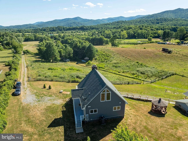 aerial view featuring a mountain view and a rural view