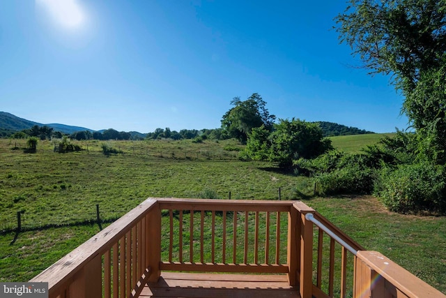 wooden terrace with a rural view