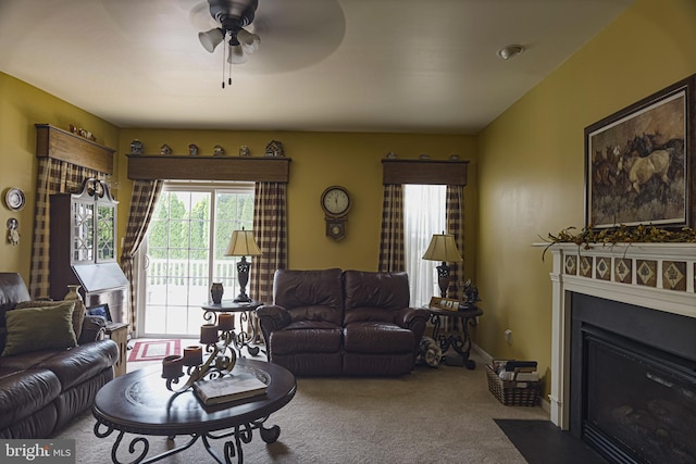 living room with carpet floors and ceiling fan