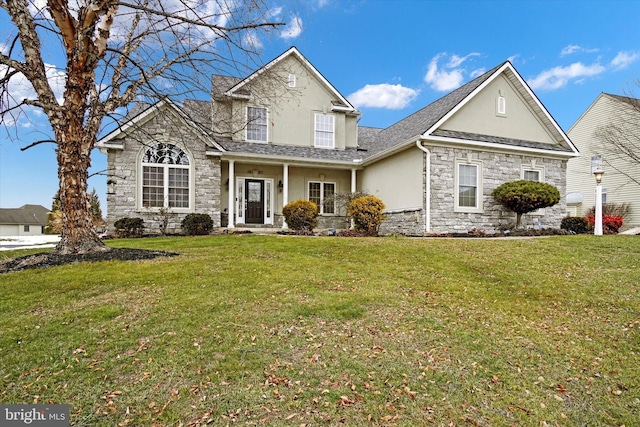 view of front property featuring a front lawn