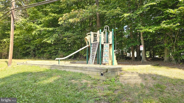 view of play area with a yard