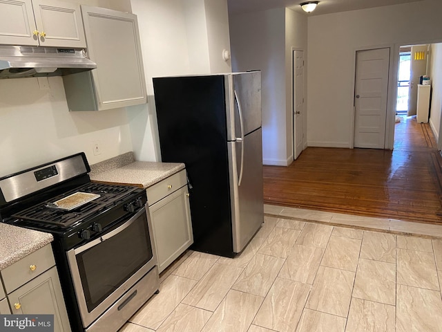 kitchen featuring light hardwood / wood-style floors and stainless steel appliances