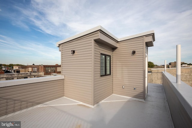 exterior space featuring a balcony