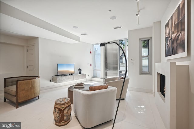 living room featuring light tile patterned floors