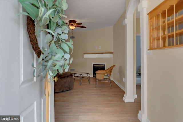 corridor featuring light wood-type flooring