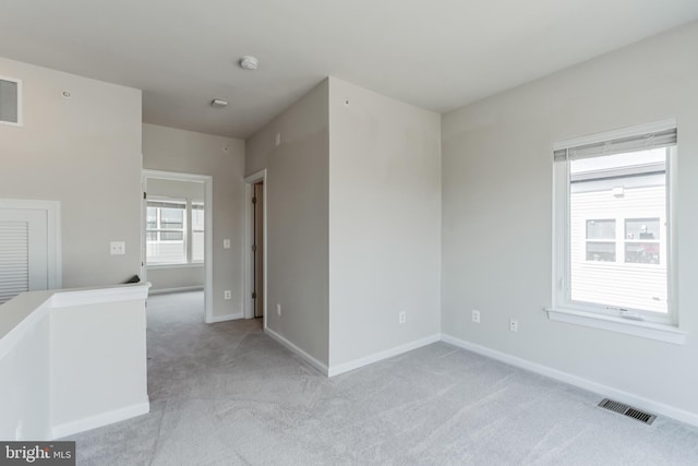 view of carpeted spare room