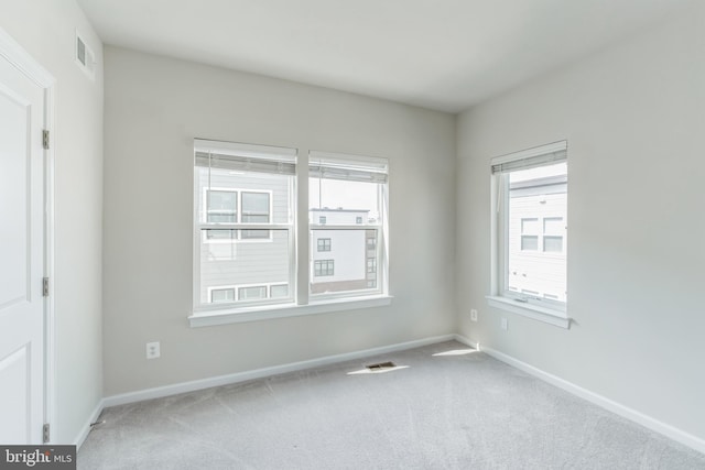 view of carpeted spare room