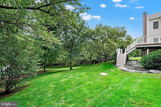 view of yard featuring a deck