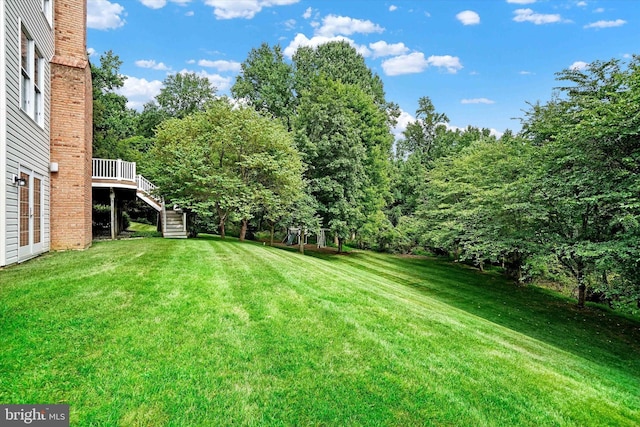 view of yard with a deck