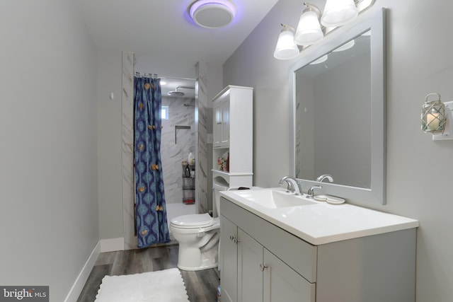 bathroom featuring hardwood / wood-style flooring, vanity, toilet, and a shower with curtain