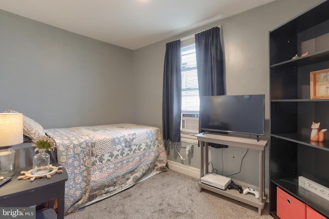 bedroom featuring carpet floors and cooling unit