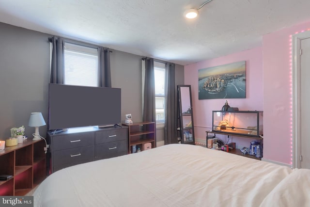 bedroom featuring a textured ceiling