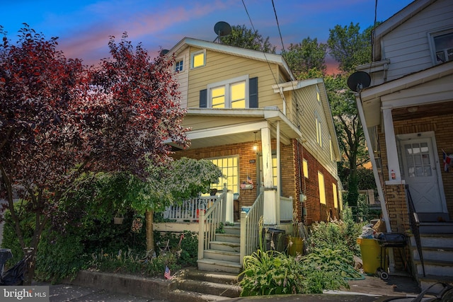 view of front of home with covered porch