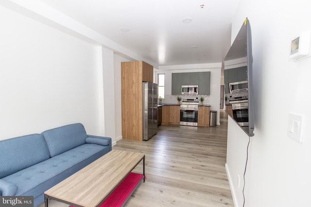 spare room featuring light wood-type flooring