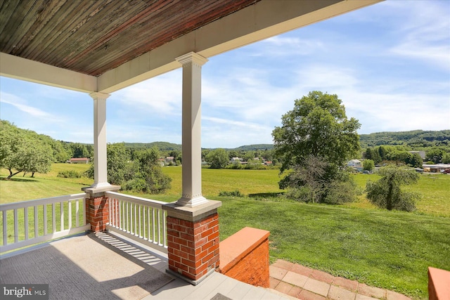 view of patio featuring a porch