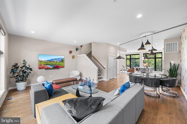 living room with light hardwood / wood-style floors