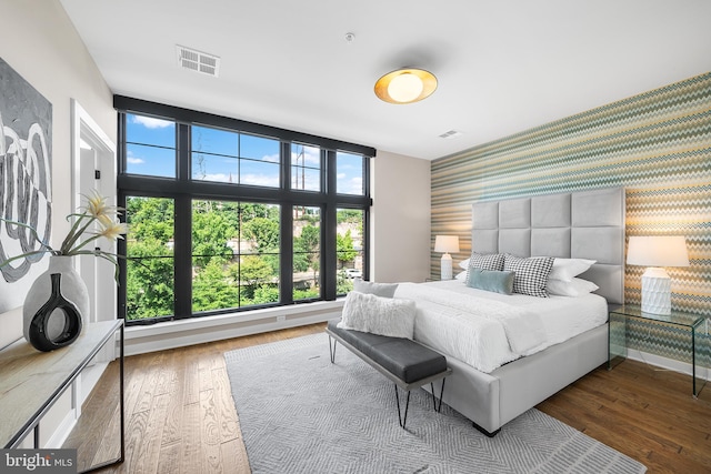 bedroom featuring wood-type flooring