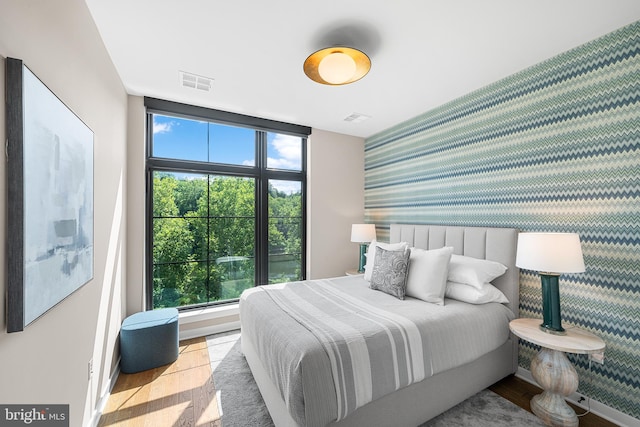 bedroom featuring light wood-type flooring