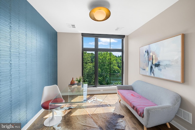 living area featuring light hardwood / wood-style floors