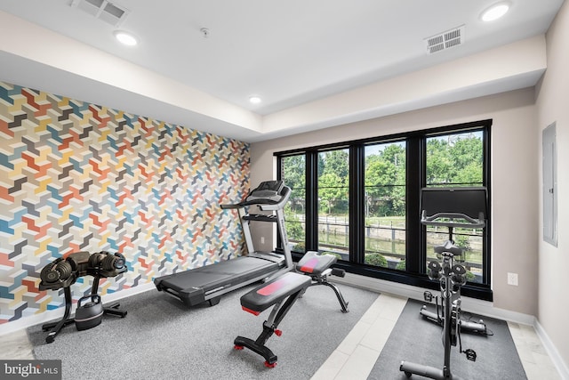 exercise room featuring electric panel