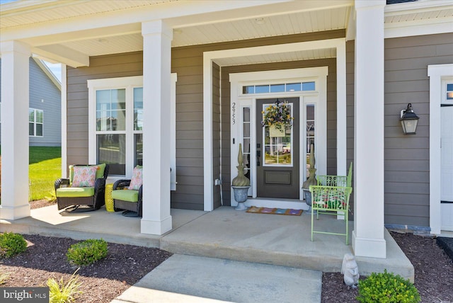 entrance to property with covered porch