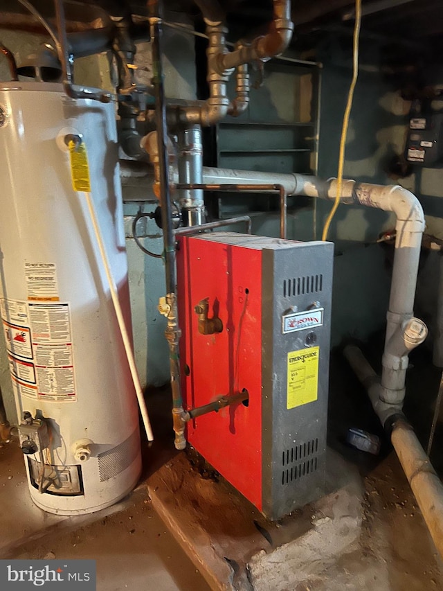 utility room featuring gas water heater