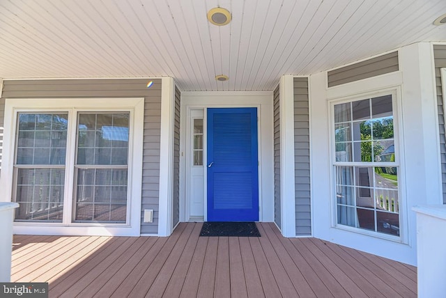 doorway to property featuring a porch