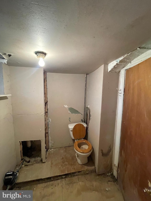 bathroom featuring toilet