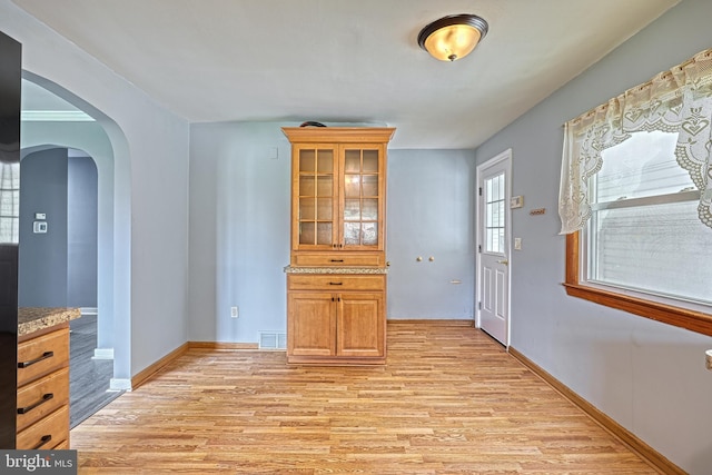 dining room with light hardwood / wood-style flooring