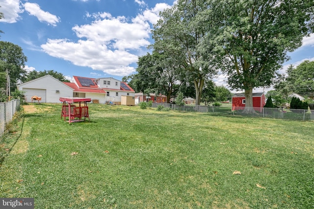 view of yard featuring a garage