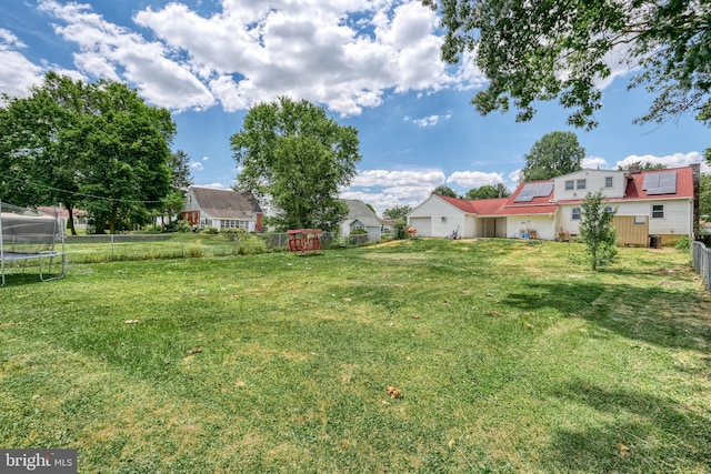 view of yard featuring a trampoline