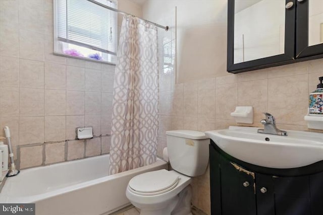 full bathroom with shower / bath combo, vanity, decorative backsplash, toilet, and tile walls