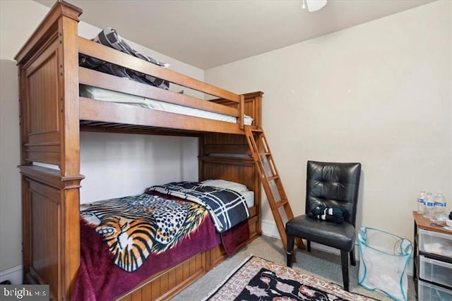 bedroom featuring light carpet