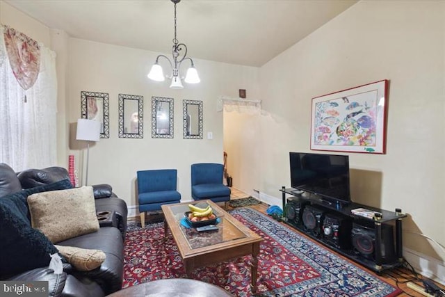 living room with an inviting chandelier