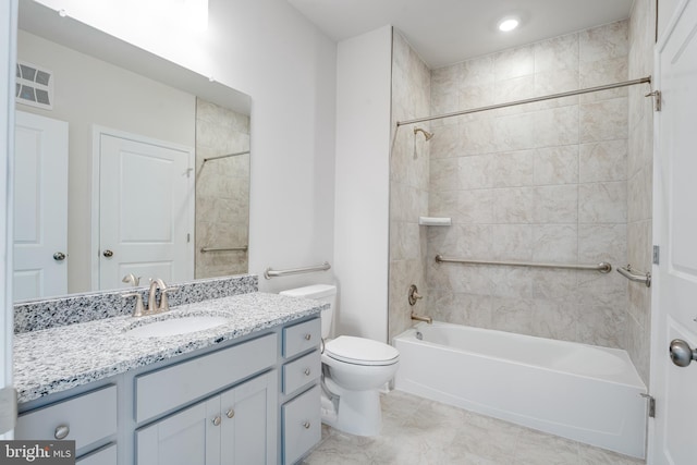 full bath featuring toilet, washtub / shower combination, visible vents, and vanity