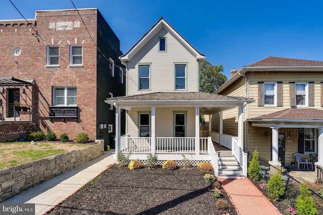 view of front of property featuring covered porch