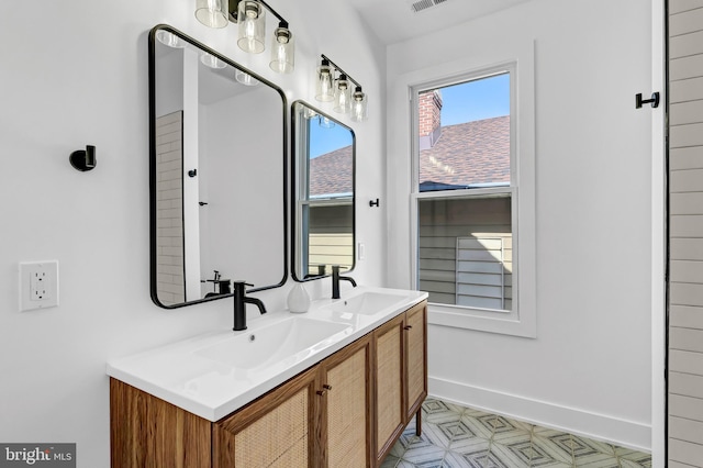 bathroom featuring vanity