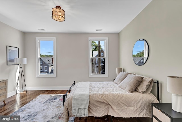 bedroom featuring dark hardwood / wood-style floors