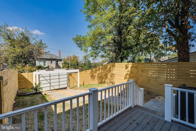 wooden terrace featuring central air condition unit