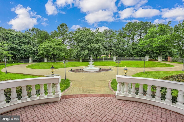 surrounding community featuring a lawn