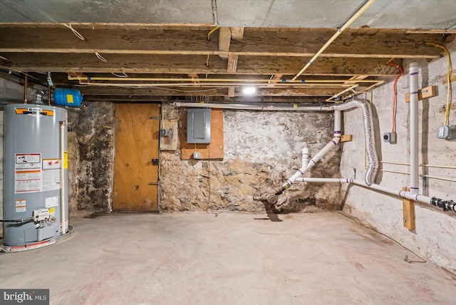 basement with electric panel and water heater